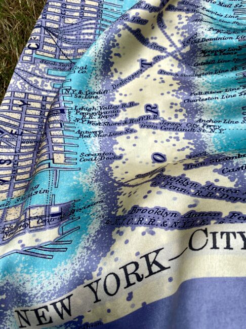 Hudson River detail on a luxury lilac silk scarf printed with a vintage map of New York City.