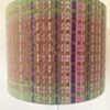Patterned green lampshade with pink and blue stitch detail from our lamps and shades edit.