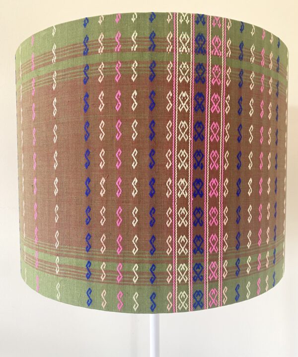 Patterned green lampshade with pink and blue stitch detail from our lamps and shades edit.