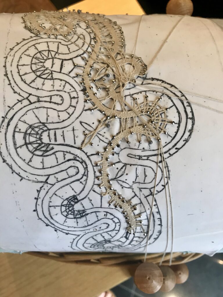 A Slovenian bobbin lace work in progress.