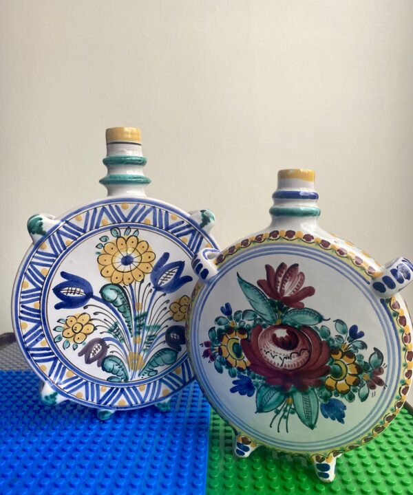 Portuguese pottery vases in unusual circular shapes and brightly, hand-painted colours.