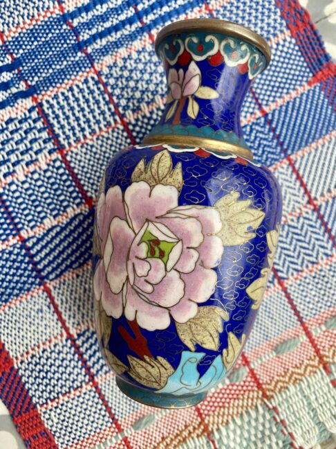 A pretty cloisonné metal pot with pretty, floral décor.