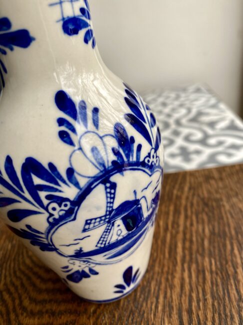 Windmill detail on a Dutch Delft pottery vase.