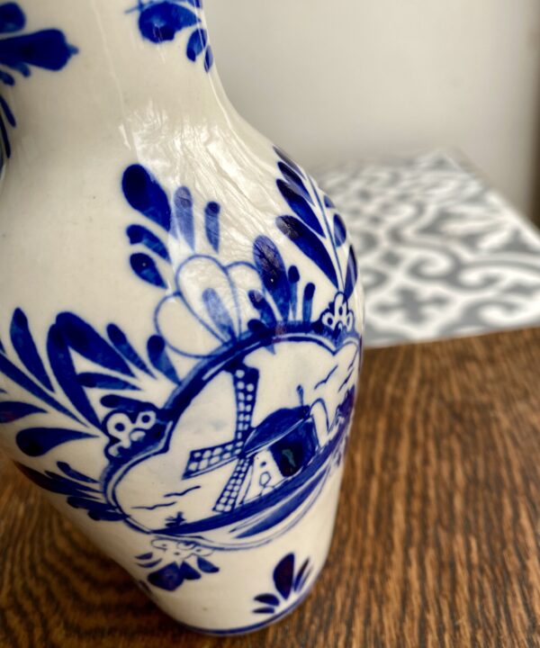 Windmill detail on a Dutch Delft pottery vase.