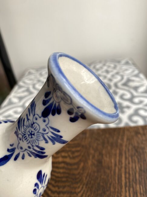 Delft vase in blue and white showing the neck detail.