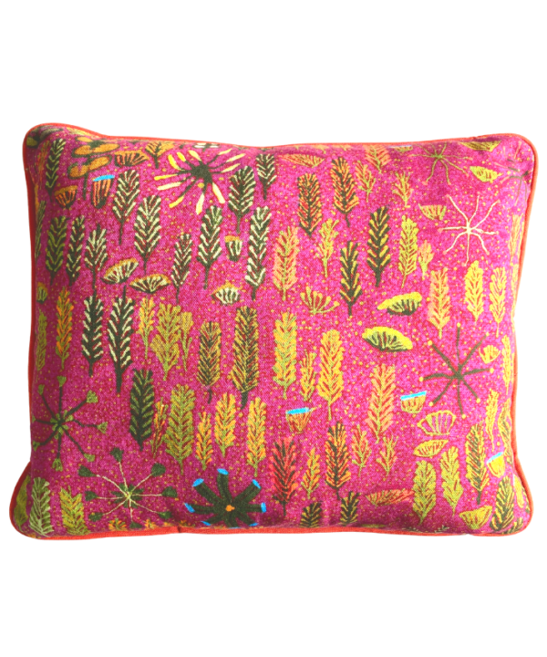 Lumbar mini-cushion with colourful, botanical, Aboriginal art print in pink with orange trim.