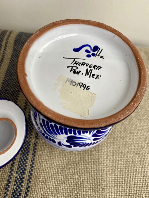 Mexican Talavera back stamp on base of a blue and white handmade pot.