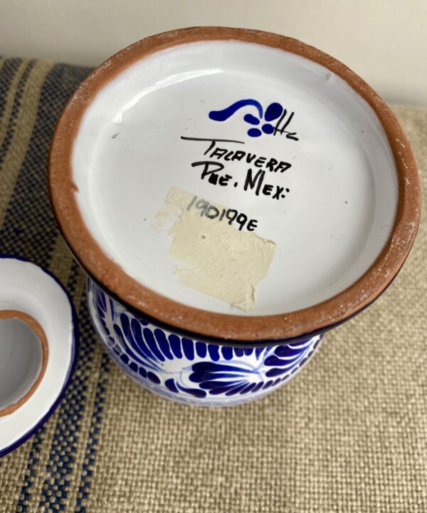 Mexican Talavera back stamp on base of a blue and white handmade pot.