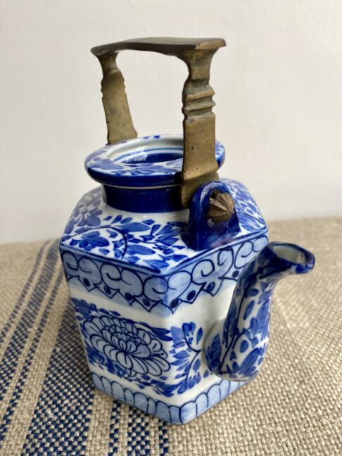 A charming Thai teapot - for decorative use - and hand-painted in blue and white.