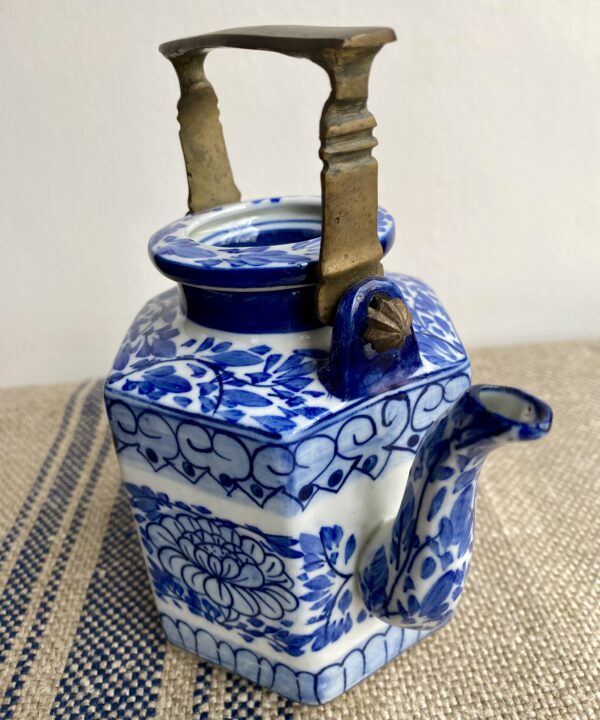 A charming Thai teapot - for decorative use - and hand-painted in blue and white.