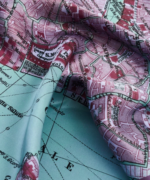 Detail of the vintage Venice map print silk scarf in purple.