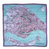 A Venice map print silk scarf in watery blue hues and mauve.