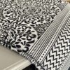 Intricate, block print cotton tablecloths in black and white handmade in India.