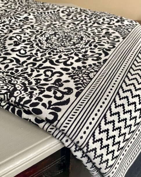 Intricate, block print cotton tablecloths in black and white handmade in India.