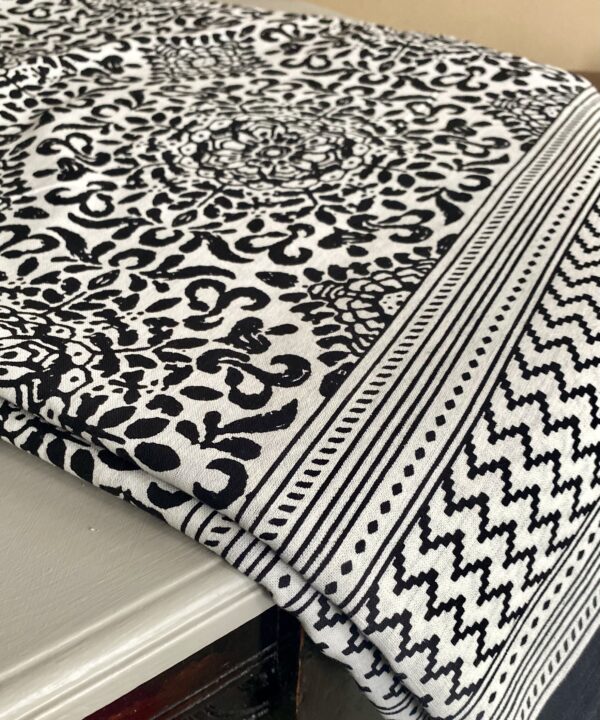 Intricate, block print cotton tablecloths in black and white handmade in India.