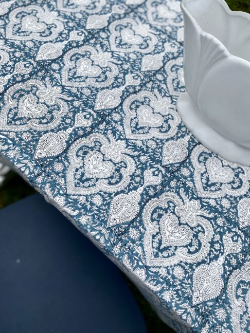 A close-up shot of a Mughal-style Indian block print tablecloth.