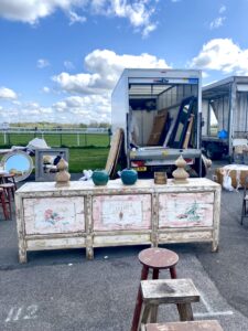 A vintage Asian cabinet or sideboard from a dealer at Sunbury antiques fair held bi-monthly at Kempton race course.