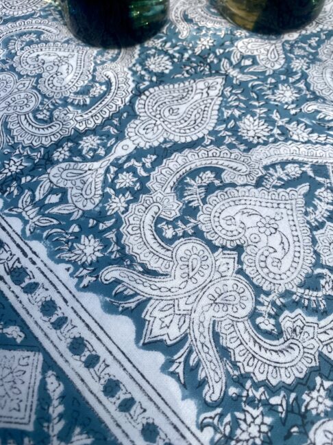 Block print tablecloth in blue with an Indian, Mughal-style paisley motif.