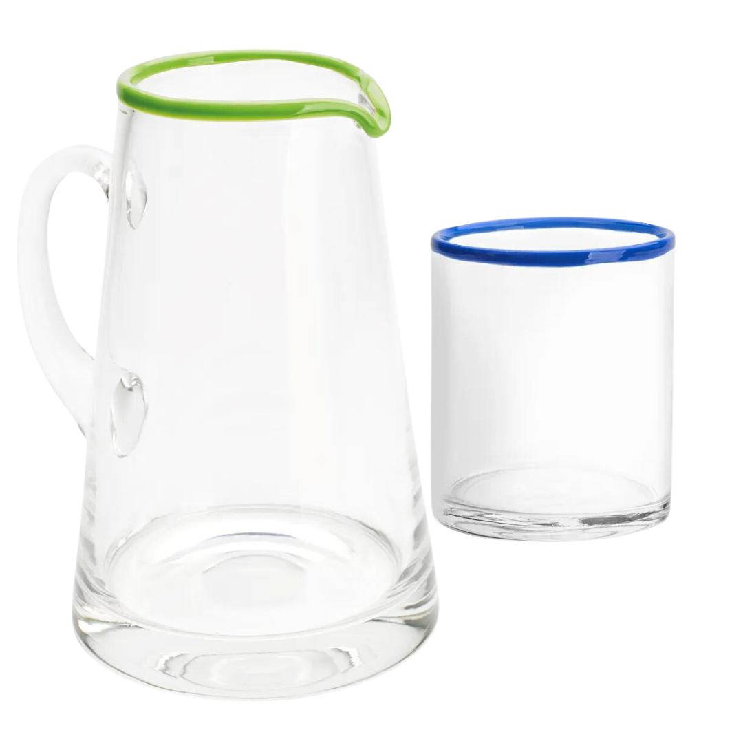 A glass jug and tumber from Daylesford Organic with green and blue rim detail.