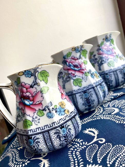 A trio of pretty, vintage jugs available as a set or singly. Vintage jugs in blue and pink floral and bird designs.