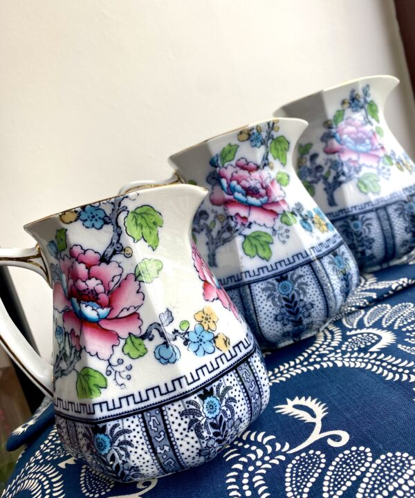 A trio of pretty, vintage jugs available as a set or singly. Vintage jugs in blue and pink floral and bird designs.