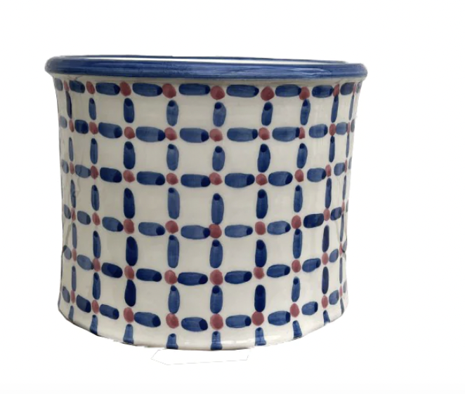 A hand-painted Spanish flower pot from The Mews Fabrics + Furnishings.