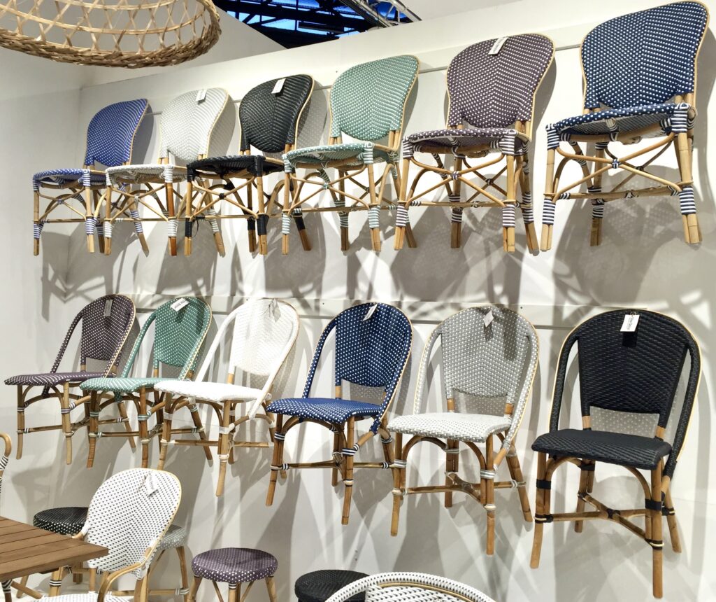 A collection of woven outdoor chairs in pastel hues by Sika Design.