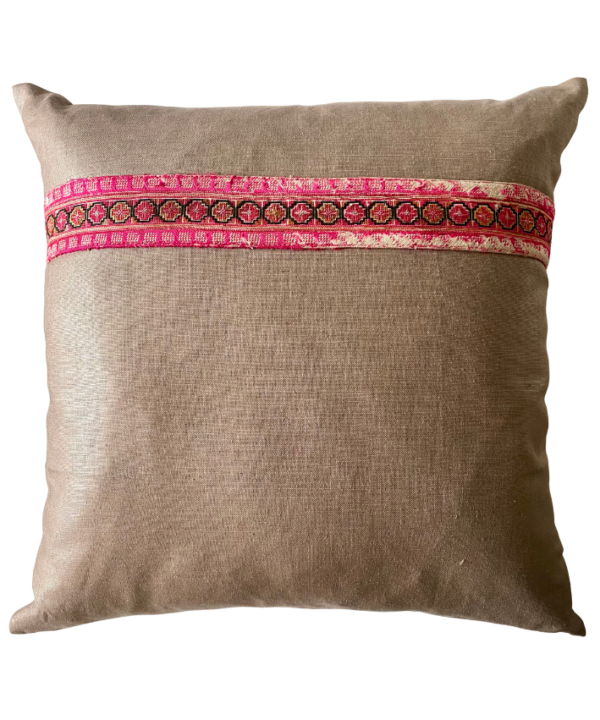 A pink and taupe vintage embroidery cushion.