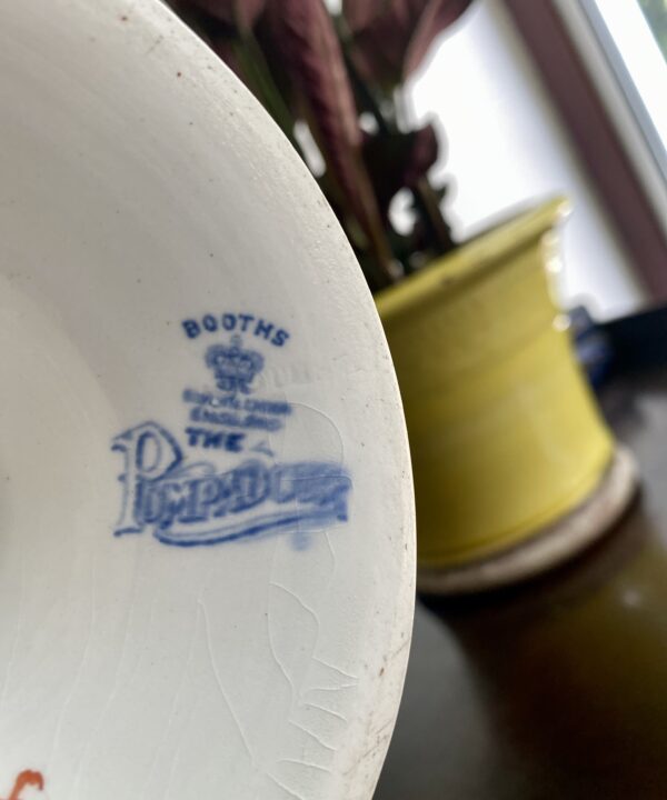 The Booths back stamp on a vintage Booths cake stand.