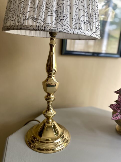 A vintage brass lamp base.