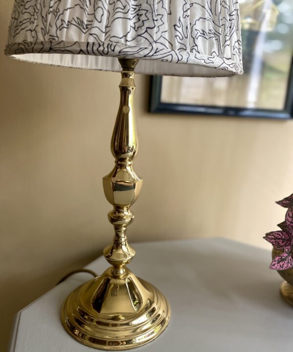 A vintage brass lamp base.