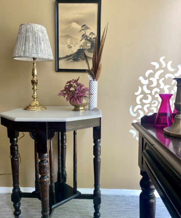 A vintage interior scheme in warm neutrals inspired by an Asian landscape print.