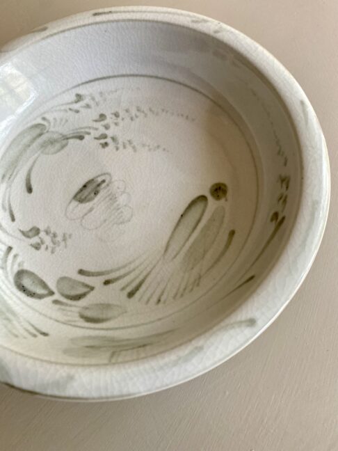 Hand-painted birds and botany on a decorative ceramic footed dish handmade in Thailand.