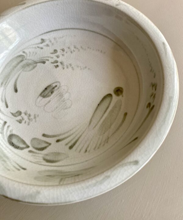 Hand-painted birds and botany on a decorative ceramic footed dish handmade in Thailand.