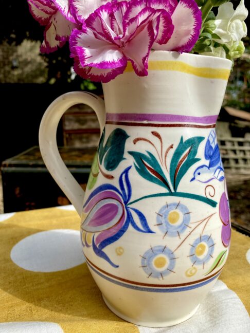 A colourful vintage Poole pottery jug masquerading as a vase!