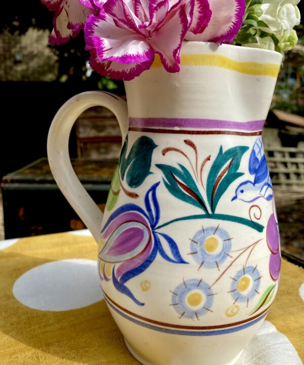 A colourful vintage Poole pottery jug masquerading as a vase!