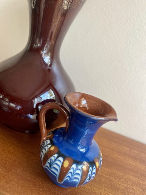 A Troyan style drip-glaze jug in miniature handmade in Bulgaria.