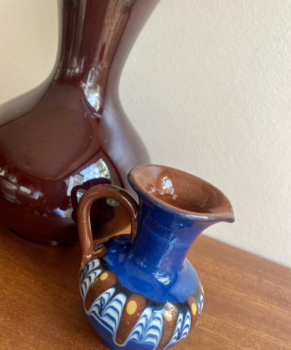 A Troyan style drip-glaze jug in miniature handmade in Bulgaria.