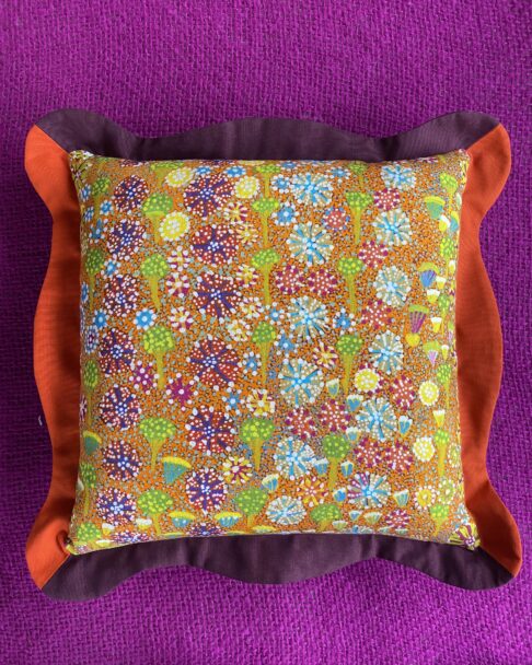 A boldly colourful indigenous Australian Aboriginal art inspired cushion fabric.