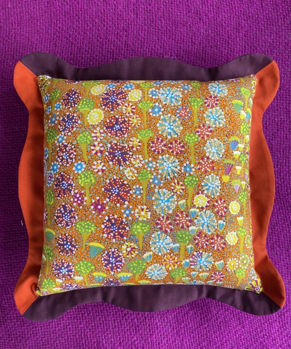 A boldly colourful indigenous Australian Aboriginal art inspired cushion fabric.