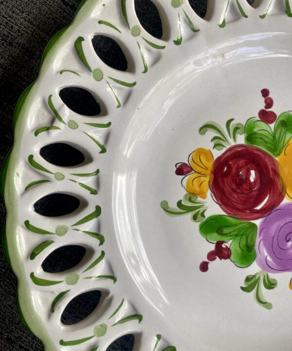 Detail of hand-painted florals on a Potuguese plate.