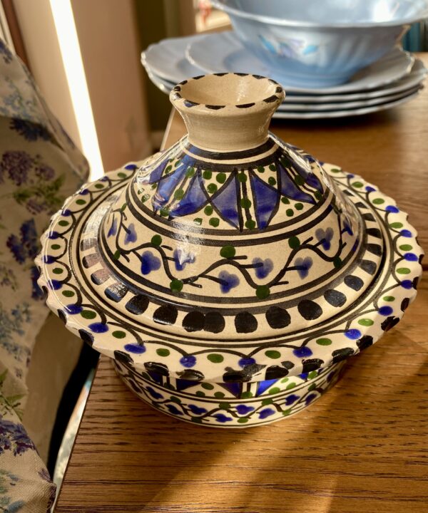 A tagine-style, decorative pot with a funnel-shaped lid.