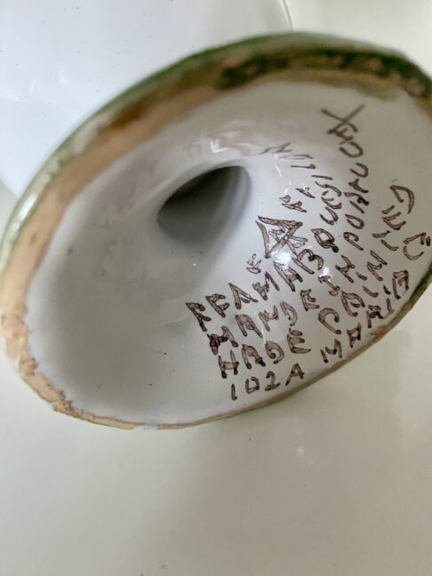 The back stamp on a hand-painted Portuguese vase.