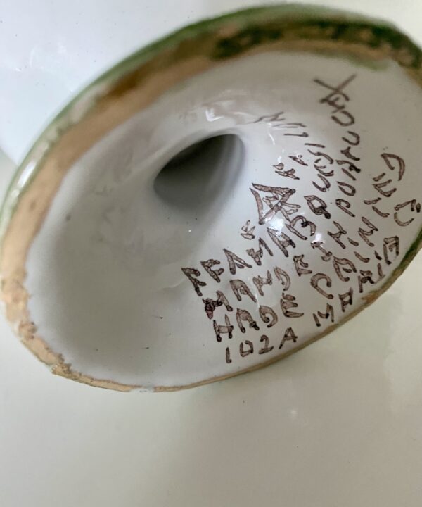 The back stamp on a hand-painted Portuguese vase.