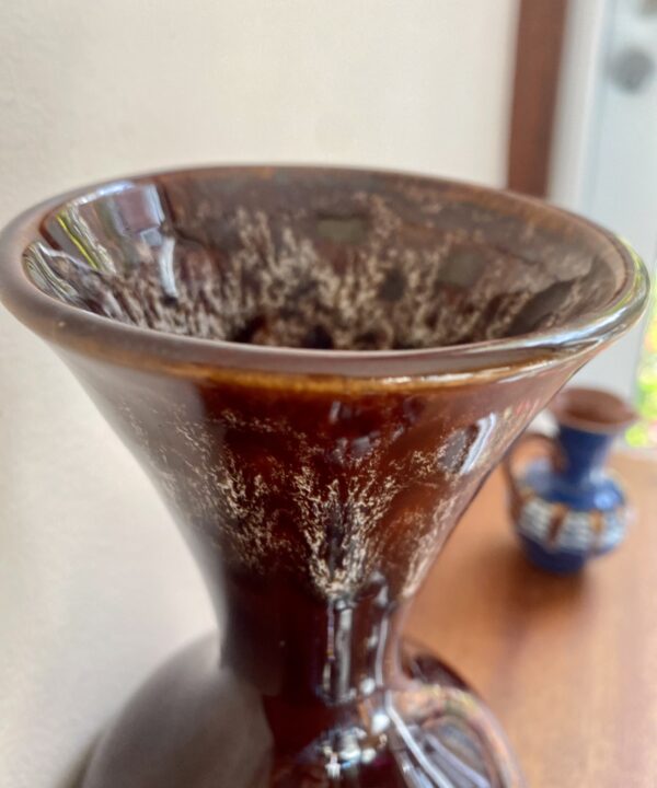 Funnel-neck detail showing the honeycomb glaze on a retro 1970s brown vase.