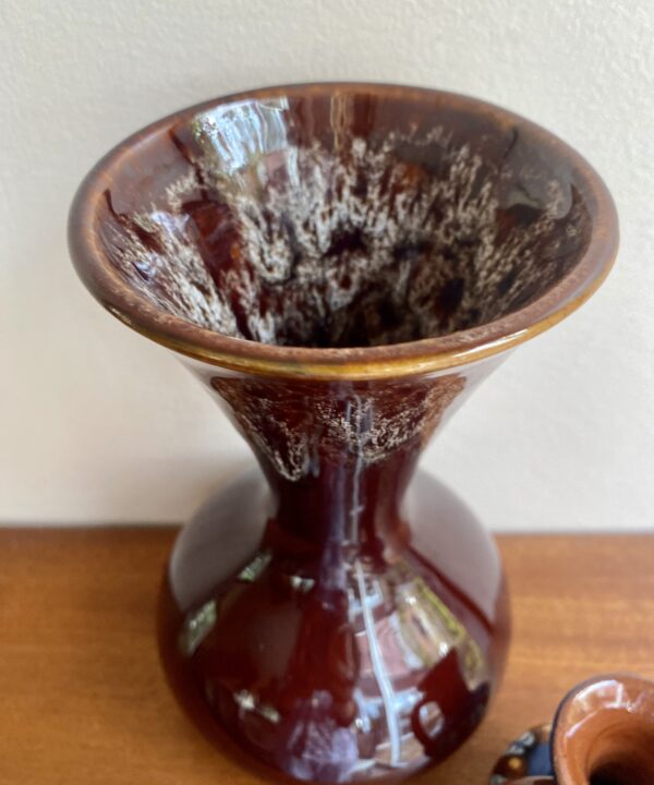 Honeycomb glaze detail on a brown, handmade. funnel-neck vase dating from the 1970s.