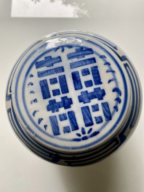 The lid of a vintage Chinese ginger jar in the Double Happiness design.