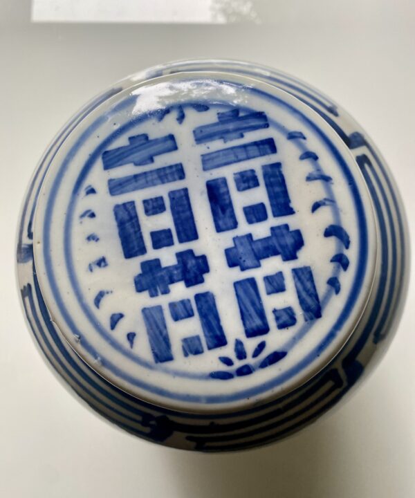 The lid of a vintage Chinese ginger jar in the Double Happiness design.
