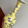 Delicate yellow Chinese bottle vase with dragon motifs