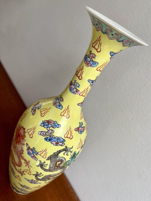 Delicate yellow Chinese bottle vase with dragon motifs